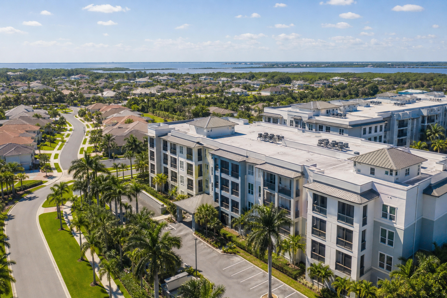 Aerial view of a Brevard County apartment community and neighboring HOA homes