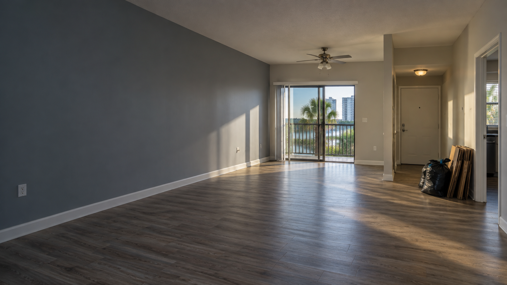 An empty apartment unit cleared of abandoned contents and ready for make-ready work